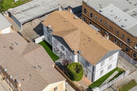 Photo of 313 W Magnolia St, Compton, CA 90220 (MLS # PW26040775)