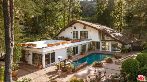 Photo of 1727 Stone Canyon Road, Los Angeles, CA 90077 (MLS # 26843377)