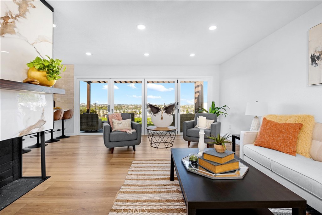 Don’t Miss This Torrance Gem! Perched in the sought-after Hollywood Riviera, 4136 Via Lado is a stunning, move-in-ready home with breathtaking panoramic views from the coastline to Downtown LA! This beautifully updated 3-bed, 2-bath home (1,508 sq. ft.) blends classic charm with modern upgrades, including a gourmet kitchen with a Dacor 6-burner stove, farmhouse sink, and built-in wine rack. The open-concept living area features grand accordion doors leading to an expansive outdoor space—perfect for entertaining. Luxury bathrooms boast soaking tubs, rainfall showerheads, and Bluetooth speakers, creating a spa-like retreat. Recent upgrades include a new A/C, furnace, and electrical panel for year-round comfort. Sitting on an 8,403 sq. ft. lot with ADU potential, this is your chance to own a slice of paradise in a prime location near top schools and local hotspots.