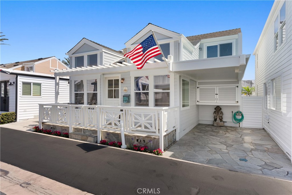 One house from the sand, with one of a kind bay views from the kitchen, both decks, and none of the typical beachfront price tag—this home in Lido Peninsula Resort offers a front-row experience without being on the main stage.
Designed with care and maintained with pride, the layout includes two bedrooms, two full baths, and a versatile loft space perfect for working, creating, or just escaping the downstairs buzz. Hard flooring flows through the lower level, and high ceilings give the space an airy, open feel.
You’re in one of the best locations in the neighborhood, with quick access to the water, marina, and shared spaces. Amenities include a bay beach just steps away, a pool, spa, gym, clubhouse, and ample guest parking - a rarity in Newport!
Whether you’re looking for a weekend place to exhale or a full-time home with a front-row seat to harbor life, this one checks the boxes—without falling into the usual real estate clichés.
Possible available boat slips for rent. Within walking distance of Newport's hottest restaurants and shopping areas (Lido Marina Village, Nobu, The Cannery). If you are looking for a quiet and secluded area in Newport while still having a great sense of community, this home could be what you are looking for! Low Land Lease of $4,128/Mo. Ask about the low property tax rate.
