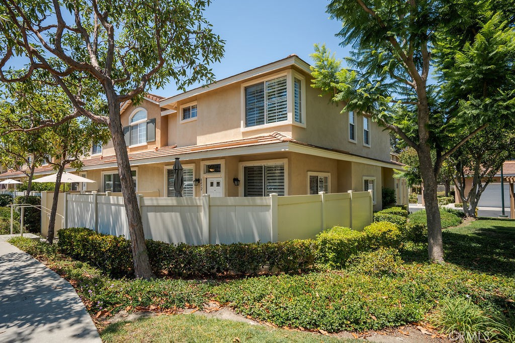 Welcome to Summit Park! This meticulously maintained 3 bedroom 2.5 bathroom home is located in the highly desired city of Anaheim Hills with top rated schools. Not to mention this is RARE corner lot with an enclosed front porch giving you and your family ample privacy. The updated kitchen includes quartz countertop, self closing cabinetry, stainless steel farmhouse sink, stainless steel refrigerator, 5 burner stove and more. Additional features are the bright and open layout, plantation shutters and brand new upgraded PEX plumbing throughout. First floor also includes a half bath and laundry area - washer and dryer is included for your convenience. As you head upstairs, you will find an oversized primary bedroom and bathroom with dual vanity, walk-in closet for her and another closet for him. Next you will find the two other bedrooms with a shared Jack and Jill bathroom. The attached 2 car garage has extra overhead storage for all your family's needs and more. Community amenities boasts a large swimming pool, jacuzzi, clubhouse, fitness room, playground, walking trails with Ronald Reagan Park being adjacent. Conveniently located close to Ralph's, CVS, Costco, Home Depot, Target, Nordstrom rack tons of restaurants and more.