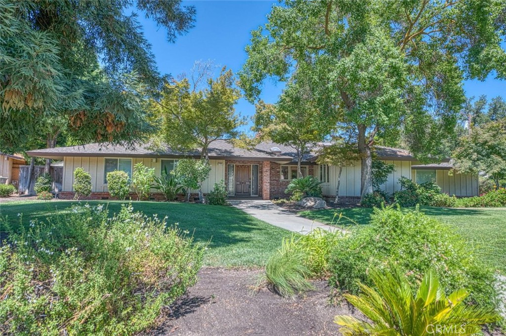 Spacious, updated, and ready to enjoy this 4-bedroom, 4-bath home offers approx. 3,726 sq ft of comfortable living on over half an acre. Situated on an approx. 24,000 sq ft lot with mature landscaping, it features a resurfaced pool, RV parking, and a layout designed for both everyday function and easy entertaining.
Inside, you'll find a chef's kitchen with top-tier appliances and granite counters that opens to a large dining area and family room with dramatic floor-to-ceiling windows and a wood-burning fireplace. A dedicated game room adds flexibility, while the layout includes a bedroom near the game room with a walk-in closet ideal for guests or multi-generational living. All four bathrooms have been updated, including a 2021 remodel of the primary bath with granite counters and a new shower.
Other highlights include wood flooring, two water heaters (2023/24), two A/C units with recent service, updated electrical with energy-efficient outlets, fresh interior and exterior paint, painted baseboards, and granite counters in the laundry room.
With an owned alarm system, newer roof (2021), and thoughtful upgrades throughout, this home blends space, comfort, and convenience in a sought-after neighborhood.