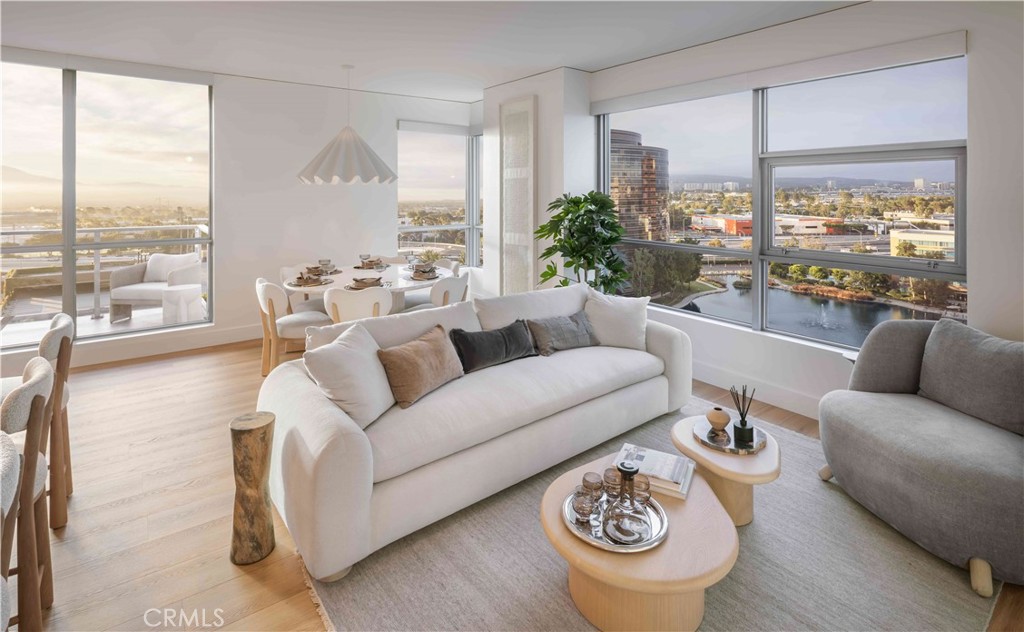 Welcome to Skyline OC — the tallest residential building in Orange County and South Coast's boldest condo transformation, where timeless design meets coastal energy. Ideally located in the heart of Orange County, Skyline OC offers the perfect balance of urban convenience and resort-style tranquility. Just moments from South Coast Plaza, world-class dining, performing arts, and major business hubs, this exceptional address puts everything within easy reach—while still feeling like a private retreat.
Welcome to Residence N803, a corner home with sweeping east-facing and lake views. This Plan E 2-bedroom, 2-bathroom residence offers ~1,346 square feet of refined living with a spacious terrace that invites seamless indoor-outdoor flow. Light wood flooring complements the open-concept design, while Frigidaire and Whirlpool appliances bring ease to everyday living. The primary suite features dual vanities, a spa-style soaking tub, and a separate glass shower, creating a serene retreat. Positioned on a prime corner, this residence is filled with natural light and skyline serenity.