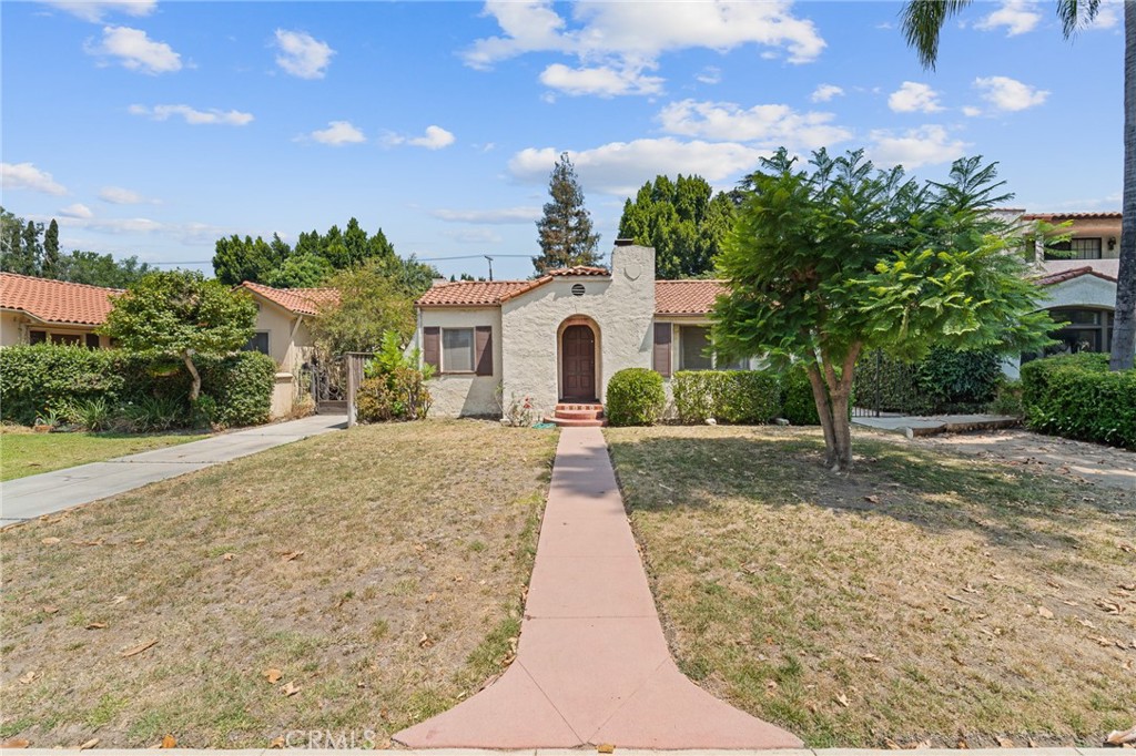 Welcome to 11039 Blix St, a character-filled 1928 Spanish-style home located on one of West Toluca Lake’s most charming tree-lined streets. This 2-bedroom, 1-bathroom home offers 1,197 sq ft of living space on a generous 8,260 sq ft lot, providing the perfect canvas for restoration, expansion, or redevelopment. Inside, you’ll find original hardwood floors ready to be sanded and brought back to life, offering the perfect blend of vintage charm and creative potential. The detached garage at the rear of the property is ideally positioned for an Accessory Dwelling Unit (ADU)—an excellent opportunity for rental income, multigenerational living, or a private workspace. The oversized lot offers ample room to expand the main house, build out the backyard, or explore further development possibilities (buyer to verify with the city). Zoned LAR1, the property presents flexible options for investors, developers, or owner-users looking to create something special. Set in a sweet, well-established neighborhood, just minutes from studios, NoHo Arts District, and easy freeway access, this is a rare opportunity to reimagine a classic in one of LA’s most vibrant communities. Bring your vision and your contractor—this is the one with all the right ingredients.