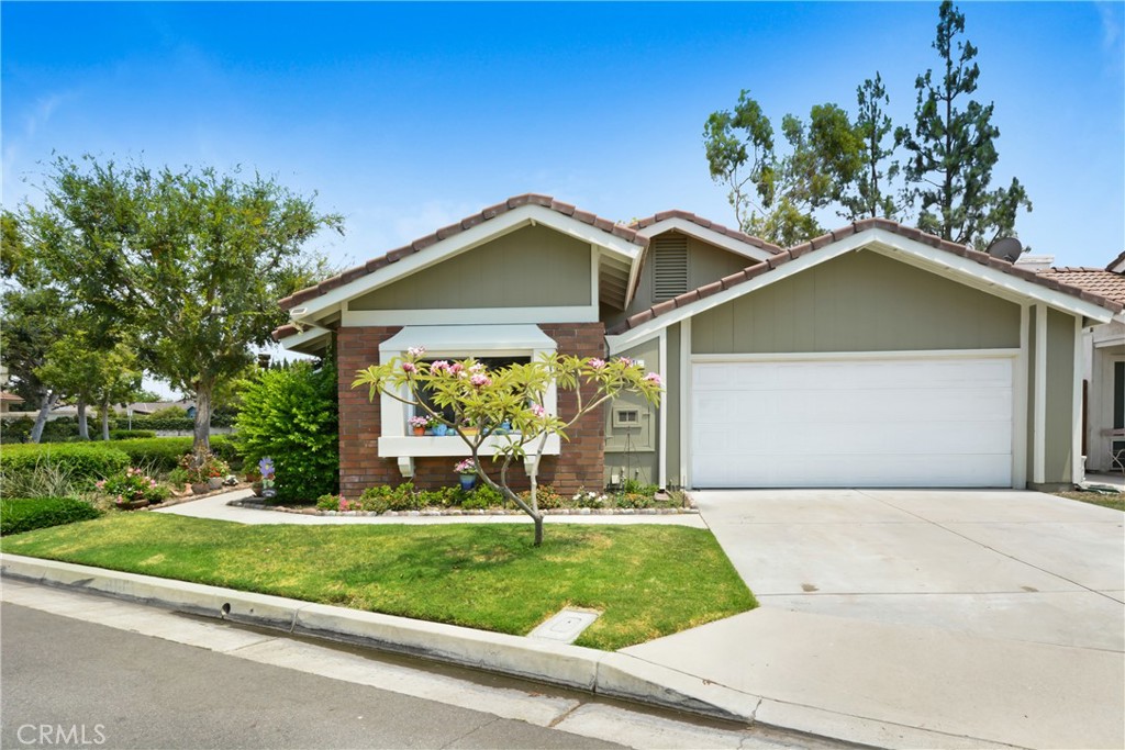 Beautifully Updated Home in River Trail Community. This move-in ready home features a stunning remodeled kitchen with a brand-new dishwasher, sleek finishes, and modern cabinetry. New Water Heater. Recessed lighting. Both Bathrooms Completely Remodeled. Completely Fresh Exterior Paint. Beautiful Atrium space that brings in tons of natural light. The large backyard offers plenty of space to entertain or build a potential ADU. Located in the quiet River Trail community with access to a pool, spa, two playgrounds, and expansive greenbelts. Close to top-rated schools and conveniently near the 55, 57, and 91 freeways.