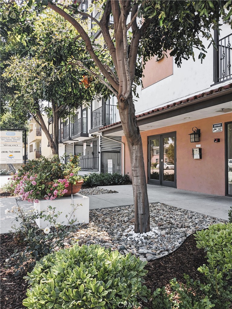 Spacious and private 2 bedroom, 2 bath apartment on the second floor with two juliette balconies, granite countertops, attractive faux-redwood flooring, and a gas-powered fireplace. Two sliding glass doors in the living room open onto a sunny interior courtyard. A sliding glass door in the master bedroom features a view of the nearby Hollywood Hills. The master bedroom boasts a spacious dual-access walk-in closet. A two-vehicle tandem parking space is conveniently located directly beneath the unit, which sits at the quiet sunny rear of the building. Camarillo Sunshine Apartments is a gorgeous Spanish Colonial Revival apartment community nestled in charming West Toluca Lake. Built in 1985 and meticulously maintained under new management, Camarillo Sunshine Apartments is a five-minute walk from the hip and happening NOHO Arts District, and a stone's throw from Studio City, Laurel Canyon Boulevard, and the heart of Hollywood. Come discover the quality, value, and convenience of life at Camarillo Sunshine Apartments, West Toluca Lake's premier apartment complex. Book a tour of this updated, premium two-bedroom apartment before it's gone.