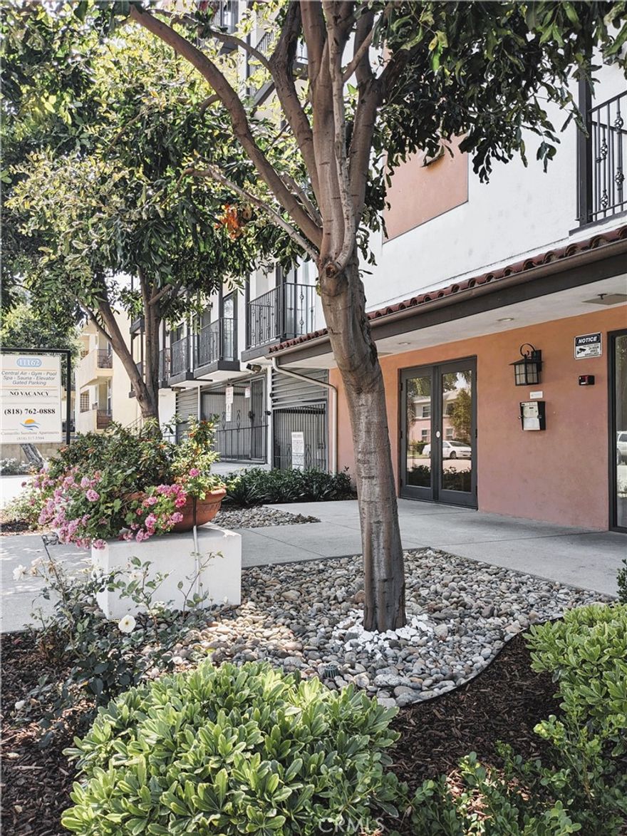 Spacious and private 2 bedroom, 2 bath apartment on the second floor with two juliette balconies, granite countertops, attractive faux-redwood flooring, and a gas-powered fireplace. Two sliding glass doors in the living room open onto a sunny interior courtyard. A sliding glass door in the master bedroom features a view of the nearby Hollywood Hills. The master bedroom boasts a spacious dual-access walk-in closet. A two-vehicle tandem parking space is conveniently located directly beneath the unit, which sits at the quiet sunny rear of the building.  Camarillo Sunshine Apartments is a gorgeous Spanish Colonial Revival apartment community nestled in charming West Toluca Lake. Built in 1985 and meticulously maintained under new management, Camarillo Sunshine Apartments is a five-minute walk from the hip and happening NOHO Arts District, and a stone's throw from Studio City, Laurel Canyon Boulevard, and the heart of Hollywood. Come discover the quality, value, and convenience of life at Camarillo Sunshine Apartments, West Toluca Lake's premier apartment complex. Book a tour of this updated, premium two-bedroom apartment before it's gone.