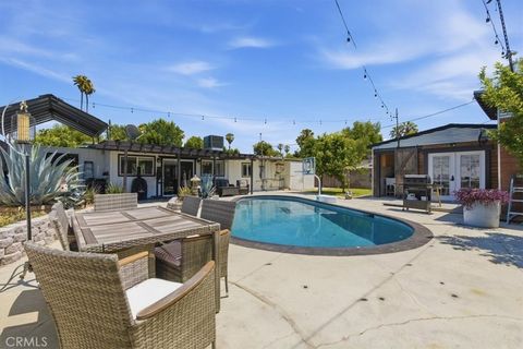 Photo of 7959 Bothwell RD, Reseda, CA 91335 (MLS # SR26101757)