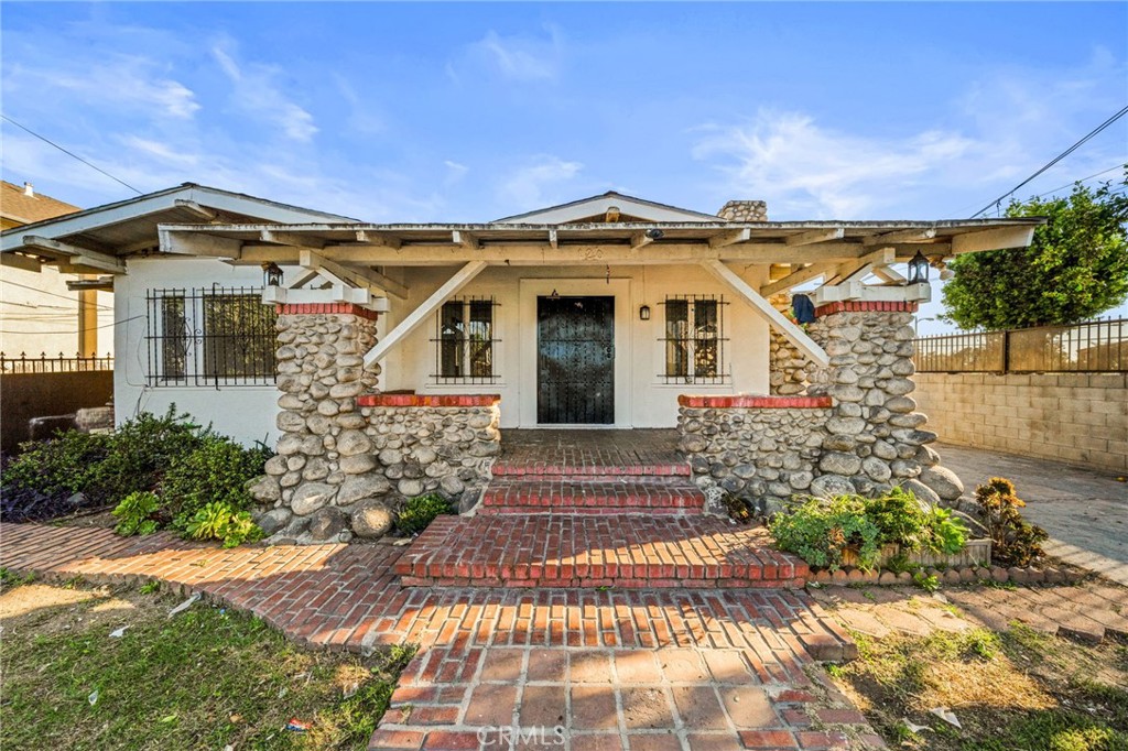 Charming single-story home featuring 3 bedrooms and 1 bathroom, perfect for comfortable living. Enjoy a fenced front and backyard offering both privacy and space for outdoor activities. A welcoming front porch invites you to relax and enjoy the neighborhood. This home combines classic appeal with functional living spaces, ideal for first-time buyers or those seeking a cozy retreat. Schedule a showing today! One or more photos have been virtually staged.