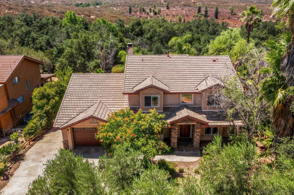 This stunning 5-bedroom, 3.5-bathroom home is ideal for families or multi-generational living. The main level features the primary suite, an office/bedroom, and a beautiful kitchen w/ abundant storage, perfect for cooking and entertaining. Upstairs offers 3 spacious bedrooms, 2 baths and a massive family room w/ balcony to take in the breathtaking sunset views. Additionally, the main level features a large deck overlooking the beautiful backyard, complete with a large concrete patio, fire pit, vegetable garden boxes, and plenty of room for a pool or horses. Access to the Bellemore trail from the backyard, a beautiful walk or ride under oak tree grove. This home is equipped with all the modern amenities, including leased solar panels, a tankless water heater, and dual-zone HVAC. It also offers under-deck and crawlspace storage for tools and supplies. The peaceful location, generous outdoor areas, and thoughtful layout make it ideal for both work and relaxation. Experience all that the Country Estates community has to offer, including a clubhouse with a restaurant, sports bar, event space, boutique hotel, 18-hole golf course, tennis and pickleball courts & a community pool/spa. The community also provides a vast trail system for horse riding, biking, or hiking, along with a 5-acre park including a second pool, bandstand, and grassy areas for picnics and community events. Plus, it's just blocks away from the Cedar Creek Waterfall Trailhead for nature lovers and adventurers alike!