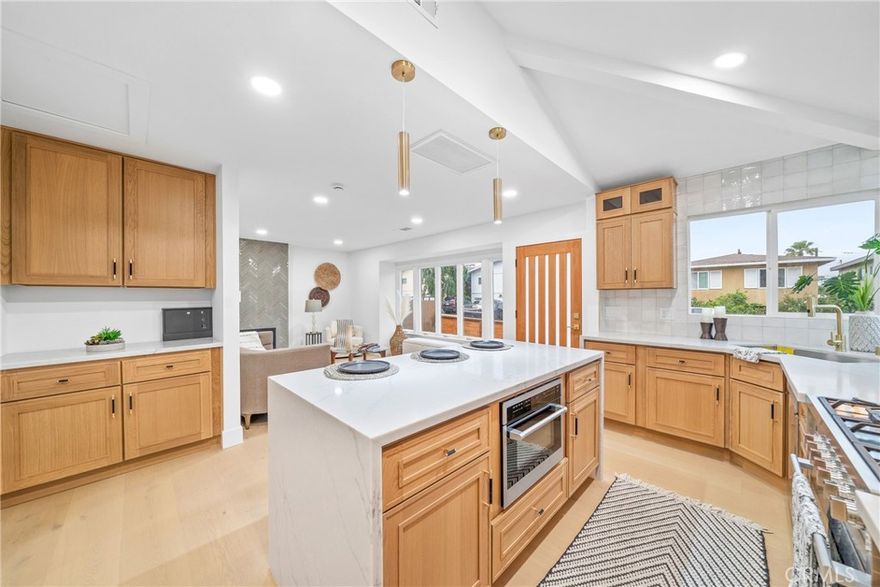 Elegant beach cottage, fully renovated in the heart of the Dana Point Lantern District. Looking for luxury in Dana Point thats walkable to everything. This is it. The gourmet kitchen with quartz counters, custom cabinetry, stainless appliances, recessed lighting and open floor plan and so much more. With the latest in designer fixtures, this is a place you can truly call home. All of the work has been fully permitted with the city and all you have to do is move in and start enjoying the beach life. With the over $250,000,000 investment happening in Dana Point this property will continue to increase in value. There are two on suite bathrooms that have been completely upgraded with the latest trends in color, style and design. New vinyl windows, new flooring and a cozy fireplace for those cool beach eventings in the winter. The generous lot and yard, are perfect for back yard entertaining,