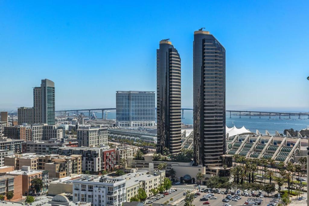 THIS IS IT! Experience the ultimate in upscale urban living in this breathtaking two-level penthouse perched high above San Diego’s exclusive Marina District this is one of the largest units in all of San Diego boasting over 4,500 square ft of space with no waste. Located in the prestigious Renaissance building, this one-of-one residence showcases dramatic city, bay, and coastline views from nearly every room, offering a lifestyle of sophistication, privacy, and comfort. Meticulously designed to offer both grandeur and functionality. From custom materials like the limestone and marble floors, to both electronic and physical bidets, as well as smart home switches in every room. Secondary bedroom with shower, jetted spa tub, and walk in closet. Additional en-suite guest room with fireplace is larger than most penthouse primary bedrooms. Chef’s Dream Kitchen, Designed for culinary excellence, the kitchen boasts a professional Wolf range, SubZero Fridge, built-in warming drawer, sleek Wolf microwave drawer, and elegant waterfall-edge stone island. Building boasts 24/7 Security & front desk staff, heated outdoor pool, spa, BBQ area, and well-equipped fitness center. Unit comes with large private storage and Two Side-by-Side parking spaces on lvl 1. Walking distance to the Gaslamp Quarter, Little Italy, Petco Park, the San Diego Convention Center, Seaport Village, and the Waterfront Embarcadero. Enjoy world-class dining, shopping, arts, and entertainment right outside your door. With quick access to major freeways and the airport, it’s as convenient as it is luxurious.