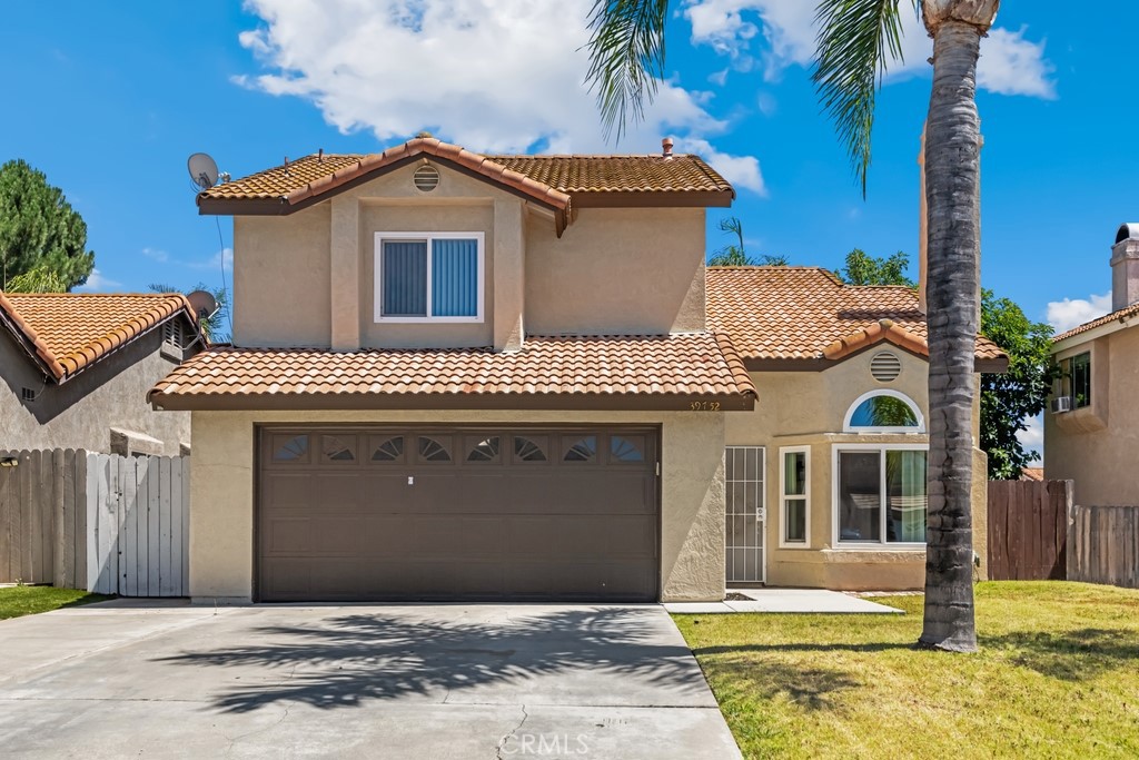 Move in ready 3 bed, 2.5 bath home with a bonus loft/4th bedroom option is ready for its new owner! No HOA and Low taxes are just the start to this home, offering great appeal with a spacious interior floor plan, laminate wood floors, new dual pane windows, high ceilings, and a neutral paint scheme. The living room features a bay window and fireplace and flows into the dining room with slider to the backyard. The dining room opens to the remodeled kitchen with granite counters, and custom cabinetry with soft close doors and drawers. There is a breakfast nook also with slider to the backyard that sits at the opposite end of the kitchen and a half bathroom for guests completes the main floor. All of the bedrooms including the bonus loft are located on the 2nd floor. The large primary suite has a built-in vanity area and an updated private bathroom with dual sink wood vanity, and a tub and shower with tile. There is also an updated full-size hall bathroom for the secondary bedrooms to share. The bonus loft area features a built-in murphy bed and desk - great for an office space and guests! On demand with the new tankless water heater. Enjoy the large private backyard with covered pergola that extends the length of the home, this space is ready for the new owner's design and would be great space for hosting with concrete space, grass border, and garden beds. Conveniently located near schools, shopping, dining. Come tour this delightful home today!