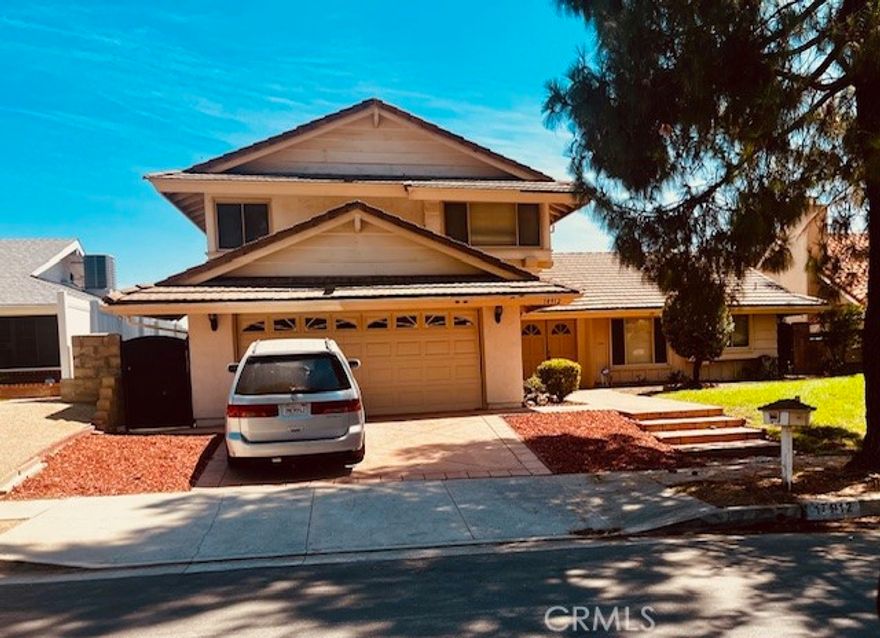 Beautiful home with view, nestled in the hill high atop of Porter Ranch. One block from  famous E.T. park. Very quite neighborhood . Home has 4 bed and 3 full baths den, formal dinning room ,kitchen with large breakfast area, large balcony with a view of the master bedroom. Newer air condition, water heater, solar panels, large sand box in back yard great place for kids to play in. No H.O.A. House can easily be converted back to 5 bedroom , great floor plan, very easy to show, hurry won't last.