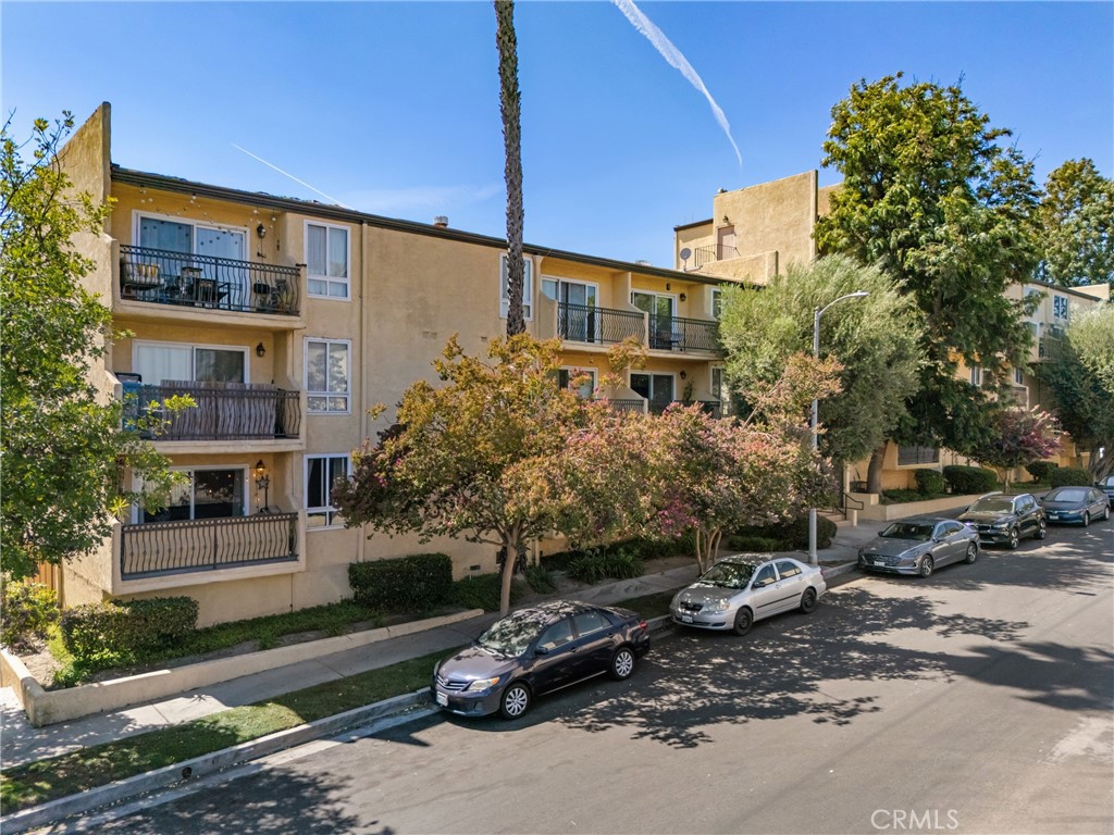 This ground-level unit features fresh interior paint, a spacious open-concept layout, and abundant natural light throughout - a thoughtfully updated 1-bedroom, 1-bathroom condo offering 674 square feet of comfortable living space in the highly sought-after Valley Village neighborhood. The living and dining areas flow seamlessly into a well-appointed galley kitchen with ample cabinetry, making it ideal for everyday living and entertaining. The generously sized bedroom includes a large closet and sits adjacent to a clean, modern full bathroom. Additional highlights include central heating and air conditioning, one assigned parking space in a gated garage, community laundry facilities, and secure building access. The property is part of a well-maintained complex with low HOA dues. Perfectly located near Ventura Boulevard, Studio City, and the NoHo Arts District, this home offers convenient access to the 101 and 170 freeways, trendy dining, shops, and entertainment. Zoned for highly rated local schools, including Colfax Charter Elementary, Walter Reed Middle School, and North Hollywood High School, this residence is an excellent opportunity for first-time buyers, investors, or anyone seeking a prime location in the San Fernando Valley.