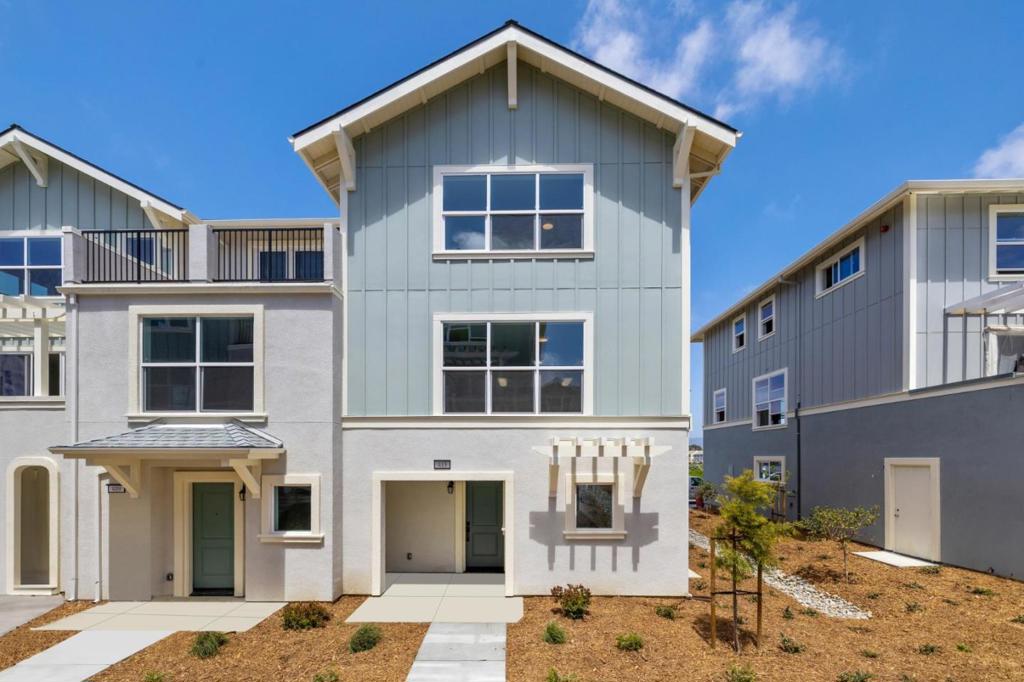 Hillcrest Residences' sales office is located at 511 Ohlone Pkwy Watsonville, CA 95076. This 3-bedroom, 3.5-bath townhome offers 1,742 sq. ft. of thoughtfully designed living across three levels. The Monte floor plan includes ensuite bedrooms on each floor, a half bath, and multiple spaces for both relaxation and productivity. Designer upgrades and a white and gray color palette give the home a clean, modern aesthetic from countertops to flooring. The entry-level features a private ensuite bedroom and a tandem 2-car garage with storage. On the main level, the open-concept kitchen is equipped with Whirlpool appliances and a large pantry, connecting seamlessly to the dining and great rooms. A built-in alcove adds flexibility for a home office, and the living room opens to a private balcony. Upstairs, the primary suite includes a walk-in closet, bathroom with double sinks, and a stand-alone shower. The third ensuite bedroom sits adjacent to the laundry room, providing privacy and functionality. Additional features include luxury plank flooring and CAT-5 hardwired internet for enhanced connectivity. Community amenities will include walking and biking trails, a sports court, fitness par course, bocce ball court, BBQ areas, picnic tables, and a children's play area.