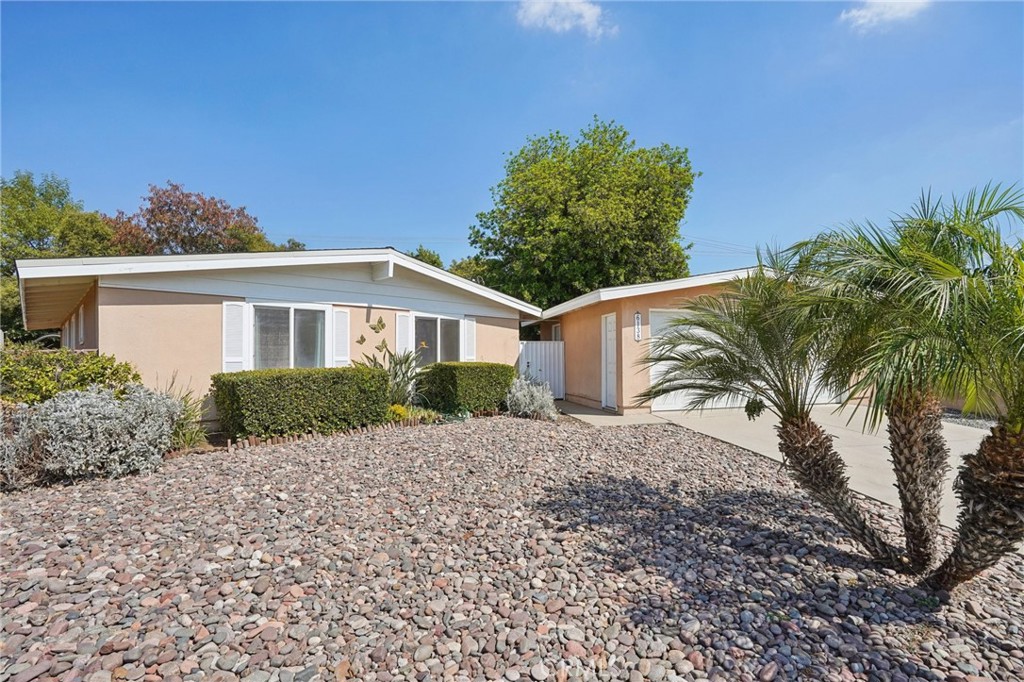Welcome to this charming 3 bedroom, 2 bathroom turnkey home situated on the border of Glendora and Azusa. Boasting features such as open beamed ceilings, large windows providing an abundance of natural lighting, gorgeous laminate flooring, smart light and thermostat features, spacious kitchen with ample cabinetry, custom curated bedroom closet shelves, a mint condition front yard-facing fence, solar panel system, a large lot size with city-verified ADU potential, a private vegetable garden, smart irrigation system, a sizable two-car garage, and well-maintained city sidewalks perfect for morning or evening strolls, this home presents the utmost sense of privacy and comfort. Conveniently located close to schools, colleges, universities, parks, local dining, shopping plazas, the Gold Line station, and major freeways/highways 210, 605, and 57, don't miss out on this exclusively unique listing to call your forever home in a safe and desirable neighborhood.