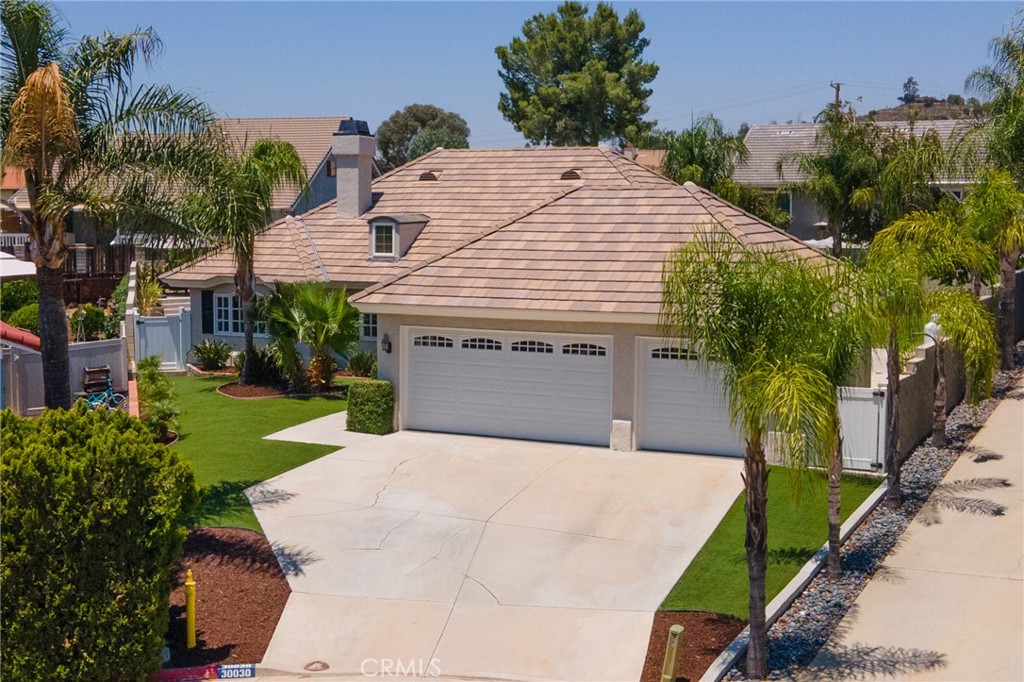 Luxury Living in the Heart of Canyon Lake! Impeccably Upgraded Pool Home in a Prime Cul-de-Sac Location. This beautifully upgraded 3 bed, 2 bath home offers the perfect blend of luxury, comfort, and functionality. The kitchen has been remodeled, complete with quartz countertops, a custom tile backsplash, and stainless steel appliances. Your fully renovated primary suite features a spa-like bathroom with a custom tile shower, dual shower heads, quartz countertops, and a walk-in closet. The secondary bathroom has also been tastefully remodeled with custom tile work and quartz finishes. The indoor laundry room features quartz countertops and custom tile. The split floor plan features real hardwood floors throughout the main living areas and bedrooms, crown molding, and tall baseboards. Enjoy the best of Southern California living with your private saltwater pool and spa, complete with a tanning deck, covered patio, and an inviting outdoor entertaining area, perfect for summer gatherings or quiet evenings under the stars. The fully tiled 3 car garage is an added bonus to this gorgeous home. This Canyon Lake gem truly checks all the boxes- upgraded throughout, beautifully maintained, and designed for indoor-outdoor living. Don’t miss your opportunity to own this exceptional home in one of the area’s most sought-after communities! Canyon Lake is a private, guard-gated lake community, offering year-round boating, fishing, and water sports. Residents enjoy resort-style amenities including a golf course, equestrian center, clubhouse, beaches, parks, and more.