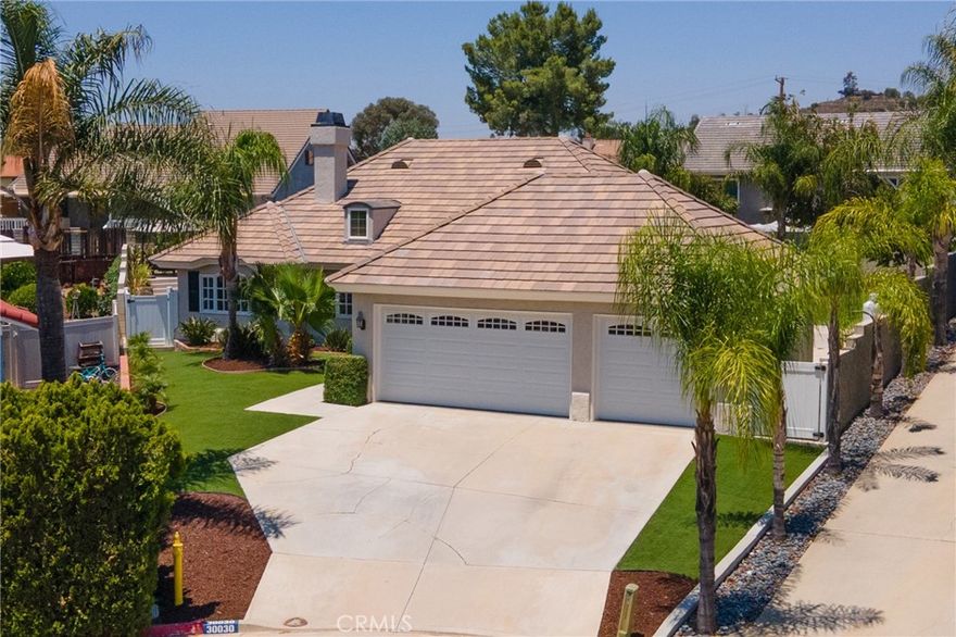 Luxury Living in the Heart of Canyon Lake! Impeccably Upgraded Pool Home in a Prime Cul-de-Sac Location.  This beautifully upgraded 3 bed, 2 bath home offers the perfect blend of luxury, comfort, and functionality.  The kitchen has been remodeled, complete with quartz countertops, a custom tile backsplash, and stainless steel appliances.  Your fully renovated primary suite features a spa-like bathroom with a custom tile shower, dual shower heads, quartz countertops, and a walk-in closet. The secondary bathroom has also been tastefully remodeled with custom tile work and quartz finishes.  The indoor laundry room features quartz countertops and custom tile.  The split floor plan features real hardwood floors throughout the main living areas and bedrooms, crown molding, and tall baseboards.  Enjoy the best of Southern California living with your private saltwater pool and spa, complete with a tanning deck, covered patio, and an inviting outdoor entertaining area, perfect for summer gatherings or quiet evenings under the stars.  The  fully tiled 3 car garage is an added bonus to this gorgeous home.  This Canyon Lake gem truly checks all the boxes- upgraded throughout, beautifully maintained, and designed for indoor-outdoor living. Don’t miss your opportunity to own this exceptional home in one of the area’s most sought-after communities!  Canyon Lake is a private, guard-gated lake community, offering year-round boating, fishing, and water sports. Residents enjoy resort-style amenities including a golf course, equestrian center, clubhouse, beaches, parks, and more.