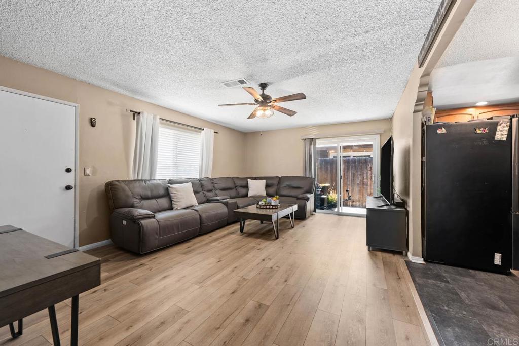 Step into homeownership with this charming single-story 3-bedroom corner unit offering 1,035 sq. ft. of comfortable living space. The open floor plan is filled with natural light, creating a bright and welcoming atmosphere from the moment you walk in. You’ll love the in-unit laundry hookups, and the convenience of both a shared one-car garage and plenty of street parking. The HOA covers your water bill, making monthly expenses more manageable. There is also a community pool! Located in a prime spot near shopping, dining, and quick freeway access, this home combines comfort, affordability, and convenience—making it the perfect first step into owning your own place.