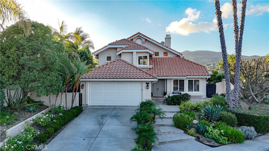 Nestled on a premium corner lot with stunning sunset views in Foster Ranch, San Clemente. This home boasts four spacious bedrooms—including a versatile, private downstairs bedroom with a full bathroom plus a dedicated office and a large loft. Step inside to discover a thoughtfully designed floor plan that's perfect for both entertaining and everyday living. At the heart of the home lies a chef's dream kitchen, complete with a large central island, sleek stainless steel appliances, and ample counter space for meal prep and casual gatherings with friends.
Your personal resort style retreat awaits in the backyard, where a custom heated swimming pool and spa beckon you to relax and unwind amid spectacular, unobstructed sunset vistas. The generous lot size provides plenty of space for play, gardening, or future expansions. With **Paid off Solar Panels**, 2 car garage, a big driveway, low HOA fees, no Mello-Roos, and top rated schools and parks nearby, you'll embrace the laid back coastal lifestyle just minutes from beaches, surfing spots, trails, golf courses, and downtown San Clemente.
This is more than a house; it's a lifestyle. Don't miss the opportunity to own this one-of-a-kind property.
