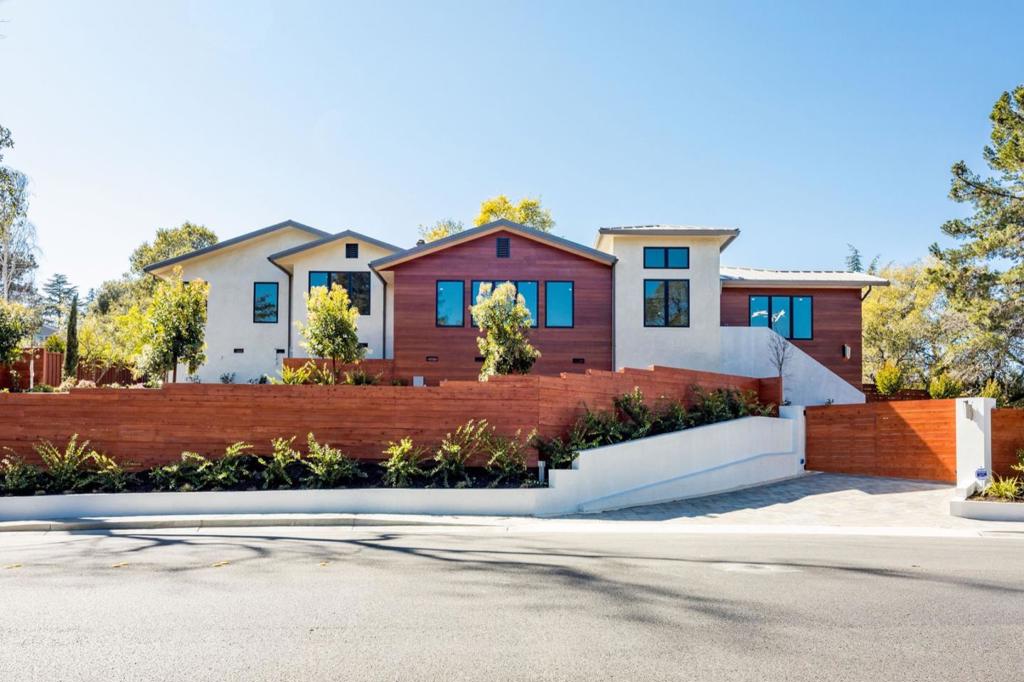 ***JUST IN - An 800+/- SF ADU just completed in 3 months!!) *** A rare opportunity to own a one-of-a-kind compound that has been "gutted to the studs" (except garage ,some foundations and some frames) and meticulously rebuilt from the ground up and crafted to provide a quality of living impossible to recreate. Situated in a large corner gated lot on one of the best streets in Hillsborough walking distance to schools and Downtown Burlingame. Unique cedar fencing, a new deluxe elevator from garage to main level, smart home, every hardware & fixture is innovative & deluxe | 2 DaVinci Fireplaces with backlit translucent stone wall cladding | state of the art kitchen with top-of-the-line sinless-steel appliances | Four accordion-style fully opening patio doors to huge flat back yard. The approx. 5,700+/- SF total floor area includes 4,000+/- SF of living space, 900+/- SF garage area, and 800 +/-SF ADU. A potential addtioal SF can be added , subject to town of Hillsborough's approval.