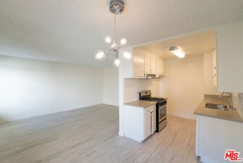 Photo of 7548 W HAMPTON Avenue #104, West Hollywood, CA 90046 (MLS # 26988809)