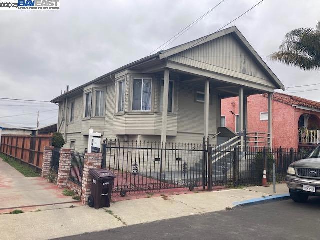 Welcome to 1073 106th Avenue, a charming single-family home nestled in the vibrant North Stonehurst neighborhood. Built in 1910, this delightful home offers 1,112 square feet of living space on a 3,800 square foot lot. The home features a spacious layout with a bright and welcoming living room, and a separate dining area perfect for entertaining.. Both bedrooms are generously sized, offering cozy retreats with plenty of natural light and closet space. This is a blank canvas with the opportunity for a buyer to remodel this home to their own vision. Plenty of room to add an ADU plus large crawl space could be converted to living space.