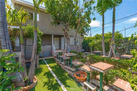 Photo of 736 W 41st Place, Los Angeles, CA 90037 (MLS # DW26081633)