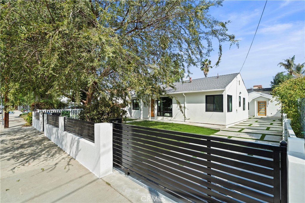 Luxurious rebuild house Price to sell! Seller paid over $500K to rebuild and add on SF. This completely reimagined from it's bone structure luxurious home is located in a highly desired neighborhood of Sherman Oaks. Displaying an open floor plan and immaculate finishes throughout. The true gourmet center island features custom cabinetry, stainless steel appliances by Viking and Thor. There are 4 bedrooms, including a very chic primary suite featuring a large, well-organized walk-in closet and a spa-like ensuite bath. This restorative bath has a furniture-grade vanity with double sinks, decorative accent tile work, and a multi-jet rain-head shower. Two additional bedrooms share a beautiful, enlarged bathroom. The 3 bedrooms 2 baths main house (1457 sqf) perfectly for a family. The private backyard is perfect, has a custom patio area and grass area, separate AUD includes 1 bedroom and 1 bathroom (360 sf) which can be rented out for extra income. The ADU creature comforts and conveniences with a stackable washer and dryer, central air and heat, stainless still appliances makes this home not only pretty but also easy and effortless to live in. Close to all of the restaurants and shopping areas.
