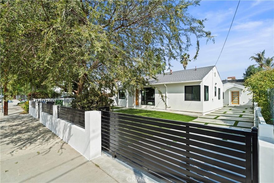 Luxurious rebuild house Price to sell! Seller paid over $500K to rebuild and add on SF. This completely reimagined from it's bone structure luxurious home is located in a highly desired neighborhood of Sherman Oaks. Displaying an open floor plan and immaculate finishes throughout. The true gourmet center island features custom cabinetry, stainless steel appliances by Viking and Thor. There are 4 bedrooms, including a very chic primary suite featuring a large, well-organized walk-in closet and a spa-like ensuite bath. This restorative bath has a furniture-grade vanity with double sinks, decorative accent tile work, and a multi-jet rain-head shower. Two additional bedrooms share a beautiful, enlarged bathroom. The 3 bedrooms 2 baths main house (1457 sqf) perfectly for a family. The private backyard is perfect, has a custom patio area and grass area, separate AUD includes 1 bedroom and 1 bathroom (360 sf) which can be rented out for extra income. The ADU creature comforts and conveniences with a stackable washer and dryer, central air and heat, stainless still appliances makes this home not only pretty but also easy and effortless to live in. Close to all of the restaurants and shopping areas.