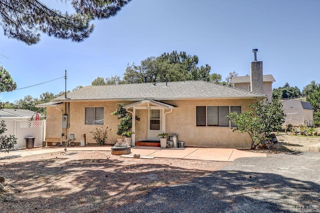 Welcome to Alpine, where you get the serenity of a country setting with convenient access to amenities like the I-8 interstate, shopping centers, and dining options. This spacious 4 bedroom 2 bathroom home features new flooring, paint and dual pane windows throughout. Newer roof and septic system along with an upgraded 200 amp panel. The private above ground pool in backyard is the perfect place to hang out this summer! The home is sitting on just under an acre of land with mature shade trees and low maintenance landscape. Don't miss the chance to own your piece of Alpine!