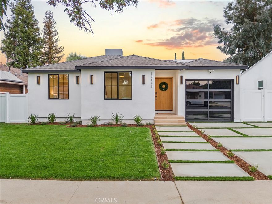 Welcome to this stunning custom-built home in Encino, perfectly situated on a generous lot! This organic modern 4-bedroom, 3.5-bath residence offers nearly 2,500 sq ft of beautifully designed living space with an open-concept indoor/outdoor layout—perfect for entertaining. From the moment you arrive, the wide frontage impresses with its expansive driveway and striking front entrance. Step inside and you’ll be greeted by a bright, airy floor plan that immediately sets the tone for sophisticated living. The formal living room at the front of the home is ideal for elegant gatherings, while the expansive great room offers the ultimate space for hosting luxurious indoor/outdoor events. The kitchen is a true showpiece, featuring floor-to-ceiling wood cabinetry, exquisite Taj Mahal quartzite countertops, and a full walk-in pantry. Adjacent to the kitchen, the sun-drenched dining area seamlessly connects to an oversized family room, where built-ins, custom shelving, and a cozy fireplace create the perfect evening retreat. Panoramic sliding doors open to a spacious deck and large backyard, creating effortless flow and extending your living space outdoors. The extra-large primary suite is a private sanctuary, complete with a walk-in closet and a luxurious spa-style bathroom featuring a double vanity and oversized shower. A secondary suite includes its own private bathroom, while two additional spacious bedrooms share a beautifully appointed bathroom at the front of the home. A separate laundry room and stylish powder room round out the interior amenities, offering total convenience and function. With thoughtful attention to detail and a well-planned layout, this home is designed to impress—featuring wood doors throughout, high ceilings, recessed and accent lighting inside and out, brand-new appliances, a finished garage, an oversized driveway, and lush landscaping. Plus, there’s plenty of space to add a sparkling pool - seller has a permit ready for you! This home truly has it all—style, space, and sophistication. Welcome home!