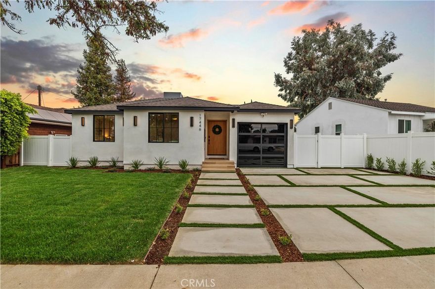 Welcome to this stunning custom-built home in Encino, perfectly situated on a generous lot! This organic modern 4-bedroom, 3.5-bath residence offers nearly 2,500 sq ft of beautifully designed living space with an open-concept indoor/outdoor layout—perfect for entertaining. From the moment you arrive, the wide frontage impresses with its expansive driveway and striking front entrance. Step inside and you’ll be greeted by a bright, airy floor plan that immediately sets the tone for sophisticated living. The formal living room at the front of the home is ideal for elegant gatherings, while the expansive great room offers the ultimate space for hosting luxurious indoor/outdoor events. The kitchen is a true showpiece, featuring floor-to-ceiling wood cabinetry, exquisite Taj Mahal quartzite countertops, and a full walk-in pantry. Adjacent to the kitchen, the sun-drenched dining area seamlessly connects to an oversized family room, where built-ins, custom shelving, and a cozy fireplace create the perfect evening retreat. Panoramic sliding doors open to a spacious deck and large backyard, creating effortless flow and extending your living space outdoors. The extra-large primary suite is a private sanctuary, complete with a walk-in closet and a luxurious spa-style bathroom featuring a double vanity and oversized shower. A secondary suite includes its own private bathroom, while two additional spacious bedrooms share a beautifully appointed bathroom at the front of the home. A separate laundry room and stylish powder room round out the interior amenities, offering total convenience and function. With thoughtful attention to detail and a well-planned layout, this home is designed to impress—featuring wood doors throughout, high ceilings, recessed and accent lighting inside and out, brand-new appliances, a finished garage, an oversized driveway, and lush landscaping. Plus, there’s plenty of space to add a sparkling pool - seller has a permit ready for you! This home truly has it all—style, space, and sophistication. Welcome home!