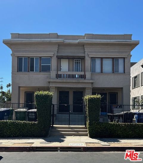 Photo of 1555 6th Avenue, Los Angeles, CA 90019 (MLS # 26668413)