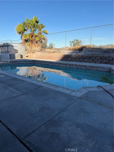 Photo of 1116 Borrego Dr, Barstow, CA 92311 (MLS # HD26083313)