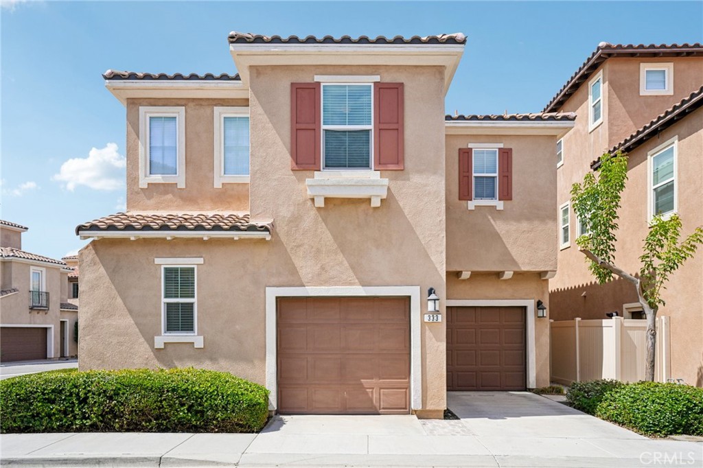 Spectacular Corner Lot Home in the Prestigious Gate-Guarded Community of Encanto
Welcome to this truly beautiful single-family residence (not a detached condo) showcasing elegant designer finishes and a private, peaceful interior location.
Step inside through the formal foyer with soaring ceilings and a dramatic wall of windows, filling the home with natural light. The open layout feels bright and airy, with engineered wood flooring throughout the first level.
The gourmet chef’s kitchen is the centerpiece of the home, featuring upgraded shaker cabinetry, quartz countertops and backsplash, stainless steel appliances, and a generous island overlooking the great room and dining area—perfect for both entertaining and everyday living.
Upstairs, the spacious primary suite offers a walk-in closet with a built-in organizer and a luxurious en-suite bath with dual upgraded vanities, stone counters, soaking tub, and a separate shower. Two additional bedrooms are located at the opposite end of the home, sharing a beautifully upgraded bathroom with dual sinks and stone finishes. A separate laundry room and a versatile loft with a built-in office and cabinetry add extra convenience and functionality.
The backyard retreat features a low-maintenance concrete patio with surrounding plants, offering a perfect balance of style and ease of upkeep. With no neighbors directly behind, you’ll enjoy enhanced privacy. A two-car attached garage and additional driveway parking complete the property.
Encanto residents enjoy access to a neighborhood park, picnic area with barbecues and fire pit, and are just minutes from Foothill Ranch shopping, dining, and award-winning schools.
This home is model-perfect, move-in ready, and a rare opportunity within this highly desirable community.