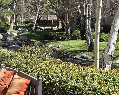 Photo of 26701 Quail Creek Crk #74, Laguna Hills, CA 92656 (MLS # PW25256887)