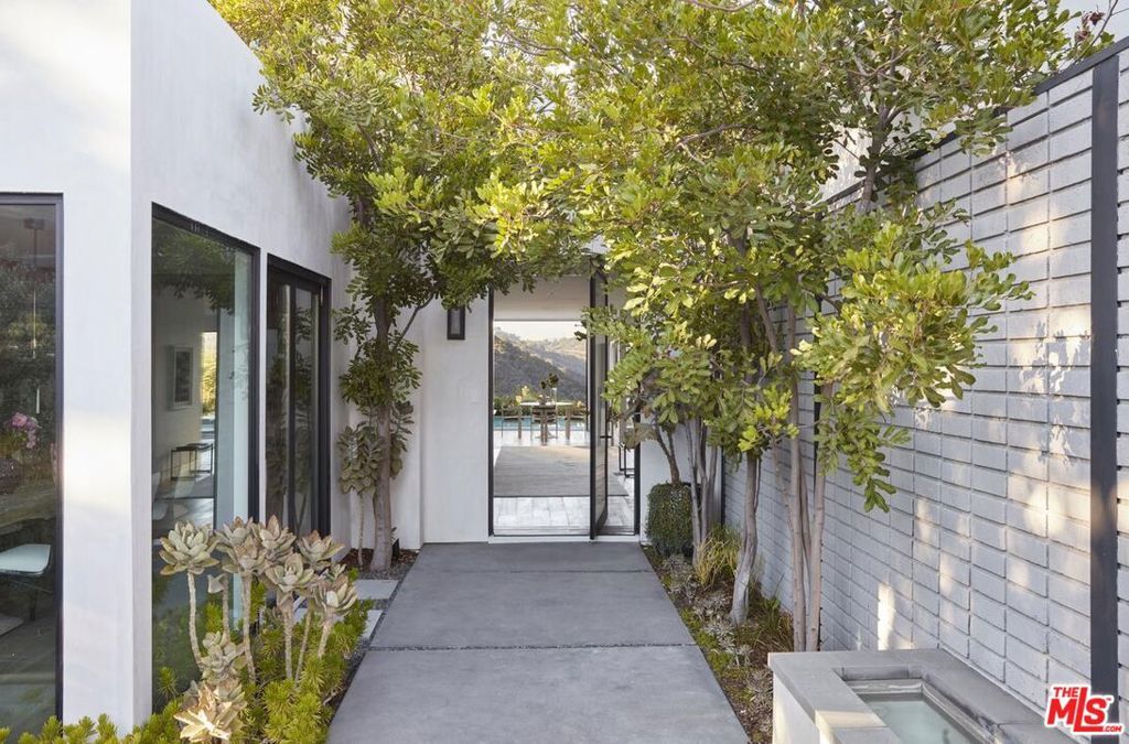 Photo of 1769 Stone Canyon Road, Los Angeles, CA 90077 (MLS # 25596807)