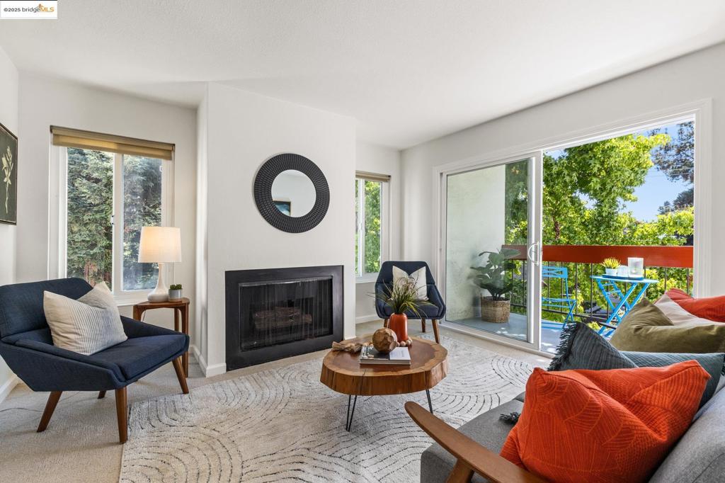 Welcome to 288 Whitmore St. #202—a rare, sunlit corner unit that feels more like a private retreat than a condo. Tucked between Rockridge and Temescal, this 1-bedroom home pairs modern updates with charming details to create a space that’s both stylish and serene. The open living + dining area is flooded with light and flows to a private patio framed by leafy green views—your personal spot for morning coffee, Zoom breaks, or sunset wind-downs. Large windows overlook a quiet courtyard, while French doors open to the bedroom. The beautifully updated kitchen features stone countertops, glass-tile backsplash, stainless steel appliances and a bar counter that overlooks the living space. New carpet adds comfort underfoot, and thoughtful finishes make everyday living effortless. Life at “Sunny Whitmore” extends beyond your walls—residents enjoy a pool, spa, fitness center, and laundry; the secured, gated parking adds convenience, but with a Walkscore of 95, and Rockridge BART, College Ave. and Piedmont Ave. shops and dining nearby, you won’t even need the car. If you have been looking to buy without sacrificing location or convenience, “Sunny Whitmore” is it!