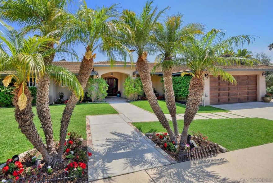 This stunning, single-level home west of I-5 in the prestigious La Jolla Palisades neighborhood, offers three spacious bedrooms and three baths. Natural light floods the interior through large windows and glass doors, highlighting the beautiful wood-lined and beamed vaulted ceilings and elegant arched doorways. The expansive backyard features a large grassy area and a spacious paved patio ideal for outdoor entertaining embodying the indoor-outdoor lifestyle. Additionally, a separate structure serves as an office or storage unit, providing versatile space for work or hobbies. Don't miss your chance to experience this incredible property!