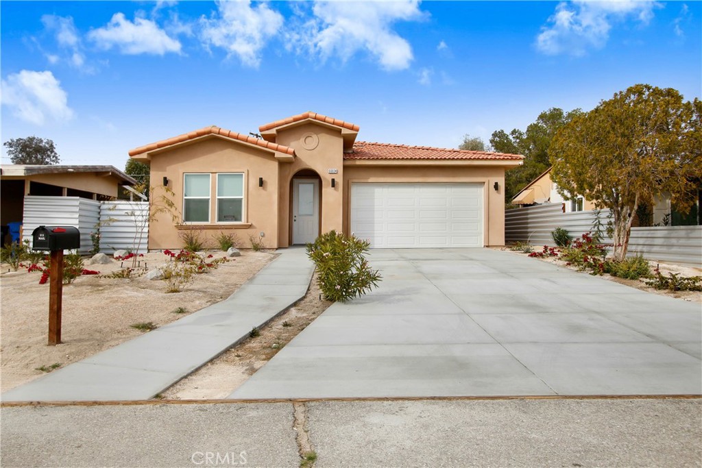 Welcome to your next great home! This newer single-story house (built in 2022) offers 3 bedrooms, 2 bathrooms, and about 2,232 sq ft of open, light-filled living space. Featuring a modern, open layout, this home comes equipped with central heat & air & owned solar panels. The kitchen shines with quartz countertops, custom cabinetry, plus a pantry and generous laundry area. Throughout you’ll find stylish tile flooring and soaring 10-foot ceilings. The master bath is a true retreat. large shower and a jacuzzi tub that invites you to unwind. Outside, enjoy a decent-sized lot with a landscaped front & and mountain views. All of this in a clean, quiet neighborhood ready for you to move in and make it yours.