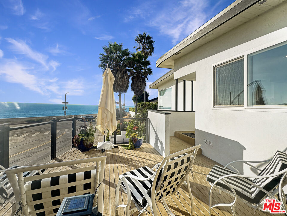 Look no further, come live your California coastal lifestyle in this Furnished Playa del Rey dream beach house with breathtaking ocean views!!! Loaded with character and charm from this quintessential mid-century modern beach pad just steps to the sand. Sun filled open floorplan offers a super spacious living room with walls of windows and mesmerizing views, high wood beam ceilings, rock fireplace, and sun-washed vinyl plank floors. Chef's kitchen with ocean view bar, built-ins, and stainless steel appliances. Enjoy your meals in the mirrored dining room reflecting stunning ocean views. Master bedroom with tranquil ocean views and ensuite bathroom. Both bedrooms have sliding glass doors that open up to the lush backyard with mature trees and grassy lawn. Attached garage with direct entry into the home. Washer/Dryer are located in a lower level storage room. Close to Marina del Rey, Manhattan Beach and Southbay beach cities. Tenant pays all utilities and gardener. Don't miss out on this incredible opportunity, come see it while it's available!