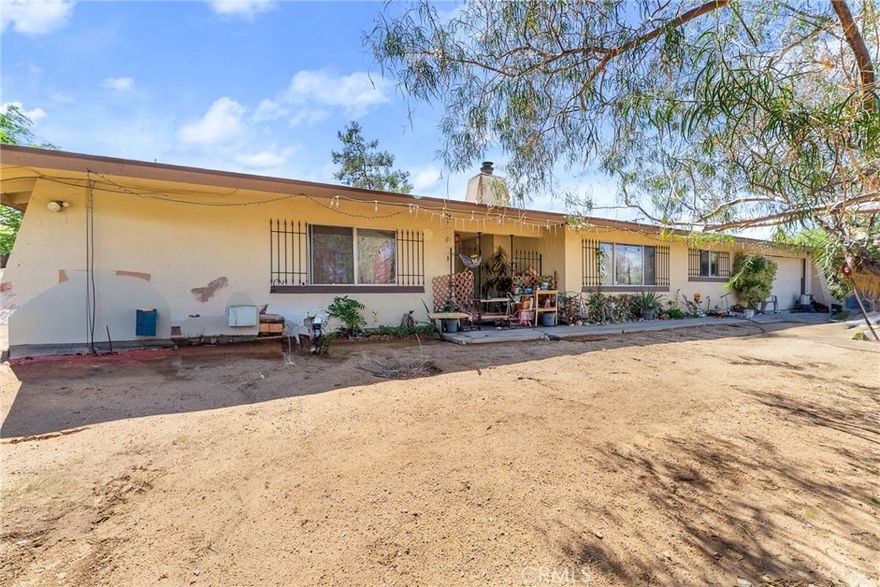 MOTIVATED SELLER!! Don't miss out on this single-story home located in a quite Sky Harbor neighborhood adjacent to Joshua Tree! This is a desired area because it is close to the National Park and Black Rock Campground. Only a minutes’ drive away from shopping. Fresh, neutral paint and new flooring throughout set the stage for your personal touches. Open floor plan flows from the living room into the dining / kitchen area—ideal for entertaining. Cozy living-room fireplace adds warmth & charm All bedrooms are located on the same level, maximizing convenience and accessibility. Laundry hookups are inside, with direct access via the attached garage. Central air & forced air; plus evaporative cooler for added comfort. The 0.42-acre fully gated property, gives way to low maintenance, while allowing space for RV Parking and a backyard of your dreams. Covered patio area perfect for al fresco dining or relaxing under shade. This a Must See Property!!!