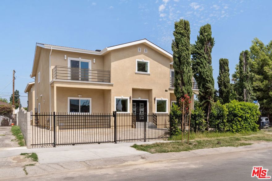 This beautifully designed unit offers a modern open-concept layout featuring laminate flooring, recessed lighting, and soaring ceilings that enhance the sense of space and light. Enjoy year-round comfort with central air conditioning and the efficiency of a tankless water heater, along with ample storage throughout.The contemporary kitchen is thoughtfully appointed with stainless steel appliances, a sleek range hood, dishwasher, garbage disposal, quartz countertops, and porcelain tile flooringperfect for both everyday living and entertaining.Bedrooms are bright and generously sized, each offering walk-in closets for added convenience. Every unit includes a private laundry area with individual washer and dryer hookups. Additional highlights include two dedicated parking spaces and separately metered utilities, ensuring efficiency and independence for each residence.Ideally located just one mile from the exciting NOHO West developmenta 25-acre mixed-use destination featuring Trader Joe's, Regal Cinemas, Nordstrom Rack, LA Fitness, and morethis property provides easy access to shopping, dining, and entertainment. Residents will also appreciate the proximity to public transportation, schools, and grocery stores.Set in a vibrant, well-connected North Hollywood neighborhood with a strong sense of community, this triplex presents an exceptional opportunity for both homeowners and investors alike. Schedule your private showing today and discover all this property has to offer.