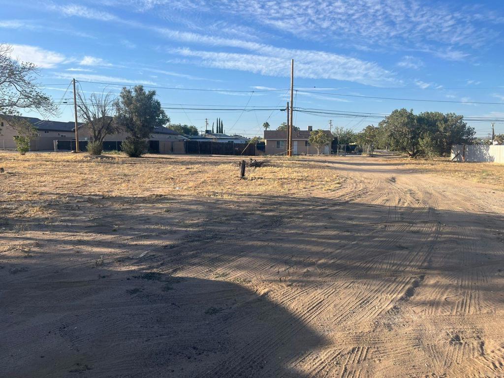 Discover the perfect opportunity to create your vision on this spacious lot located at 16446 Yucca Street in the growing city of Hesperia. This flat, usable parcel offers approximately 3,550 square feet (buyer to verify) with paved street access, making it ideal for building your custom home. Situated in a peaceful neighborhood with nearby established homes, you will enjoy convenient access to Main Street, shopping centers, schools, dining, and the 15 freeway for an easy commute. Utilities appear to be nearby (buyer to verify), simplifying your building plans.