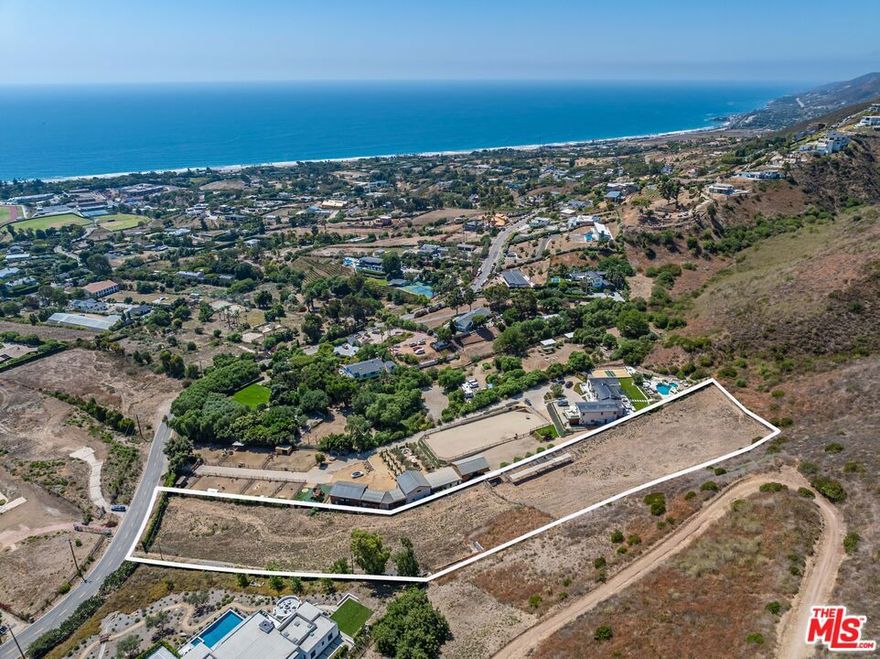 Discover this unique opportunity located in the sought-after Malibu Park neighborhood with unobstructed ocean views and the Santa Monica Mountains as your backdrop. With 2.45 usable acres, this equestrian dream property has been designed by Burdge Architects with recently upgraded and approved planning department plans for a fire rebuild 3-bed, 2-bath, 3,182 Sq.Ft. home. This spacious lot includes existing horse stables, room for a riding ring/barn, and has easy access to the world-class Zuma Ridge riding/hiking trail. The planning-approved two-story home is situated on the high side of the property, giving both stories a vantage point above all of Malibu Park. The former septic system has been removed, and temporary power is currently onsite for horse-caretaking purposes. Enjoy the close proximity to the beach, schools, markets, restaurants, and outdoor activities like mountain biking and horseback riding. Start building your dream home and experience Malibu at its finest. Burdge Architects are available for interested buyers to correspond regarding the city of Malibu timelines and logistics.