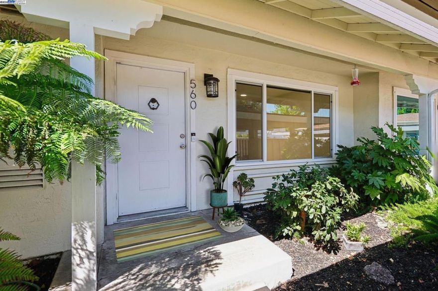 Motivated Seller!!  Beautiful NORTHEAST facing townhome tucked at the end of a quiet court in the desirable Twin Creeks neighborhood!  Recently updated with beautiful elegant oversized tile flooring & baseboards in the living room/dining room/kitchen.  Large spacious light filled living room has new recessed lighting & ceiling fan.  Updated modern kitchen with quartz countertops, full tile backsplash, gray cabinetry & stainless steel appliances, including refrigerator.  Dining Room with plenty of space for entertaining opens to the private back patio with beautifully tiled patio, shade & storage.  Guest bathroom is located off kitchen and laundry closet in kitchen with washer and dryer included has additional overhead storage cabinets.  Spacious primary bedroom upstairs w/mirrored closet doors, new ceiling fan and large window overlooking backyard.  Two additional bedrooms with mirrored closet doors and recently added overhead lights.  Updated full bathroom with newer vanity, sink, light fixture & mirror.  This move-in ready home also features Nest Smart Thermostat, Dual Pane Windows, 1 Assigned Carport Parking Space, Ample Guest Parking and Community HOA Pool.  Located close to top-rated San Ramon Schools, parks, shopping, dining, City Center Bishop Ranch & Easy Freeway Access.