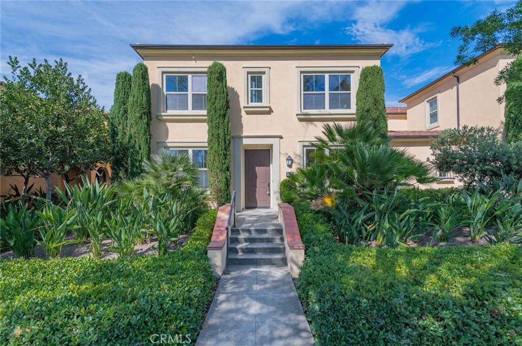 Highly desirable end unit located in the Santa Barbara tract of Woodbury within the award-winning Irvine Unified School District. This open floor plan features brand-new luxury vinyl flooring, fresh custom paint, and an upgraded kitchen with new quartz countertops and backsplash, a large island, stainless steel appliances, and direct access to the two-car garage with keyless entry. The main level includes a bedroom and full bathroom, perfect for guests, in-laws, or a home office. Upstairs, the spacious primary suite offers a coffered ceiling, recessed lighting, walk-in closet, and en suite bath with privacy door. The secondary upstairs bedroom also has its own private bathroom. Enjoy a private patio with a versatile bonus space that can be used as an office, gym, or extra storage. Conveniently located just half a block from the elementary school, pool, and park, and within walking distance to Woodbury Town Center. Landlord could provide washer, dryer, and refrigerator.