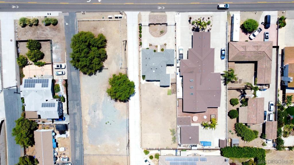 A rare Bonita opportunity to build significant equity awaits with this family home on a sprawling, park-like lot—the largest and most promising parcel available in its price range. The vast, usable land is a blank canvas, offering limitless potential for a high-income ADU, a private pool oasis, and your dream backyard. The home itself is a structurally sound foundation with unique, convenient features like a pass-through garage, awaiting your personal touches to add immense and immediate value. Nestled in a premier family community, enjoy a short, safe walk to the highly-regarded elementary school, with the vast greenbelts of Rohr Park, local golf courses, and the trails of Sweetwater Reservoir just minutes away. Your investment is strategically secured by the proximity to the multi-billion dollar Chula Vista Bayfront redevelopment, a landmark project set to boost the entire region's value. This is a unique opportunity to acquire a legacy property offering an unmatched combination of land, lifestyle, and financial upside. Disclaimer: The following information is provided for informational purposes only and is based on documents provided by the seller. This summary is intended to be a helpful overview and is not a guarantee of development potential. All buyers and their agents are strongly advised to conduct their own independent investigations and due diligence with the appropriate city, county, and state agencies to verify all information, including but not limited to zoning, permits, fees, and building regulations. Do not rely solely on the statements presented here. Summary of Development Potential for 5361 Central Ave, Bonita, CA 91902 Based on the provided documents, here is a breakdown of the property's zoning and potential for additional units. Property Zoning Information The property is located in an unincorporated community of San Diego County. Zone: RS (Residential Single). Building Type: C - Allows for one single detached dwelling unit per lot. Minimum Lot Size: 10,000 sq. ft.. Maximum Height: G - 35 feet or 2 stories. Setbacks: The "H" designation requires specific setbacks: Front: 50 feet (measured from the centerline). Side: 10 feet. Rear: 25 feet. Option 1: Accessory Dwelling Unit (ADU) Development Under standard ADU regulations, the property could potentially accommodate a total of three units on the lot. This would include the existing main home plus two additional units. (1) Junior Accessory Dwelling Unit (JADU): This involves converting a portion of the existing primary house into a separate unit. A garage conversion for a JADU has a maximum size of 500 sq. ft.. (1) Accessory Dwelling Unit (ADU): This can be either attached to the main home or built as a separate, detached structure. Detached ADU: A new, standalone structure. The maximum allowed size is 1,200 sq. ft.. Attached ADU: An addition that shares at least one wall with the primary house. The maximum size is up to 50% of the existing home's square footage. Conversion ADU: An existing garage or other permitted accessory structure can be converted into an ADU. The County of San Diego offers several pre-approved ADU building plans ranging from 600 to 1,200 sq. ft.. Option 2: Senate Bill 9 (SB9) Development The property meets the criteria for California Senate Bill 9 (SB9), which may allow for more extensive development. Eligibility: The parcel is located within an Urban Area and a single-family zone , and it does not intersect a Very High Fire Hazard Severity Zone. Maximum Units: SB9 projects are limited to a maximum of four units on the property. Unit Combination: This could include two primary units, one ADU, and one JADU, as long as the total does not exceed four units on the lot. Potential Building Permit Fees The County of San Diego has a fee schedule for building construction permits (effective 07/01/2025). For an Accessory Dwelling Unit, the estimated fees would be: Guest House/Accessory Dwell...